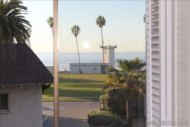 a view of a balcony with plants