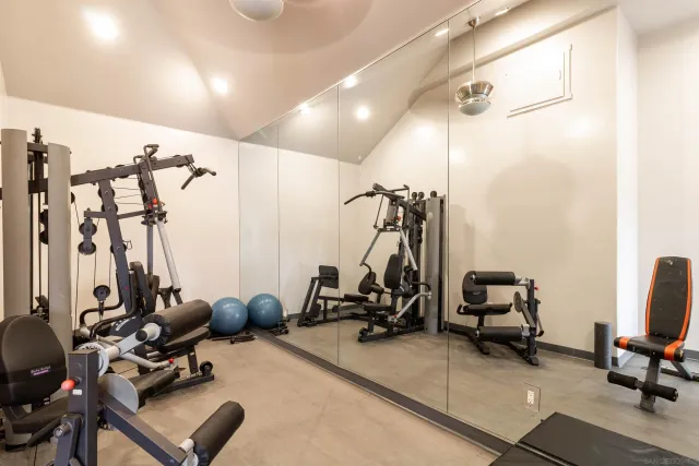 a view of a room with gym equipment