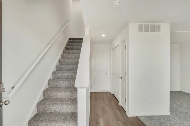 a view of entryway with stairs