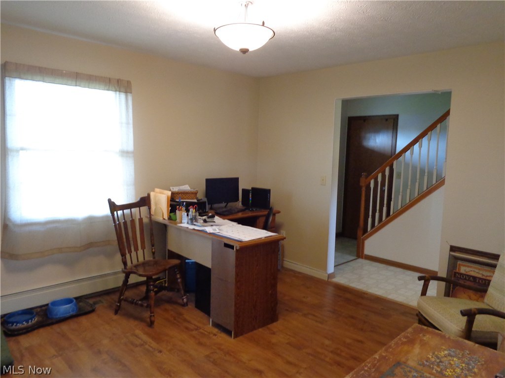14214 Kneisel Road Vermilion, OH 44089 - Photo 10 of 24 Living room currently used as an office.