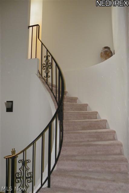2614 Sweitzer Road Uniontown, OH 44685 - Photo 14 of 25 Another curved staircase view