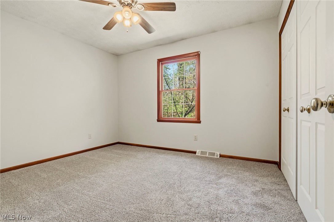 5347 Ashby Street Northwest Canton, OH 44708 - Photo 31 of 46 Bedroom #3 with brand new carpet and fresh paint