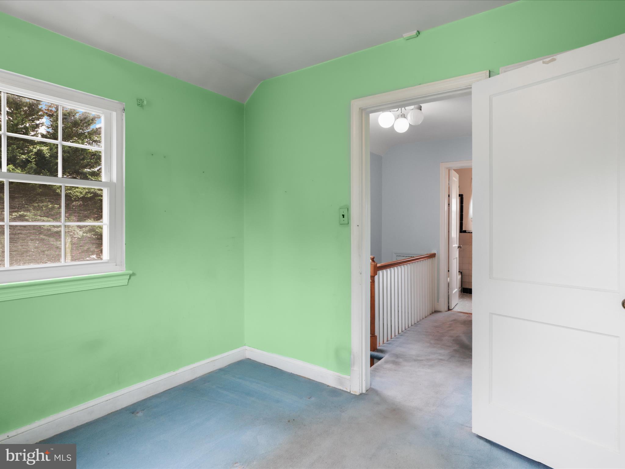 1808 Cody Drive Silver Spring, MD 20902 - Photo 17 of 41 an empty room with windows and entrance