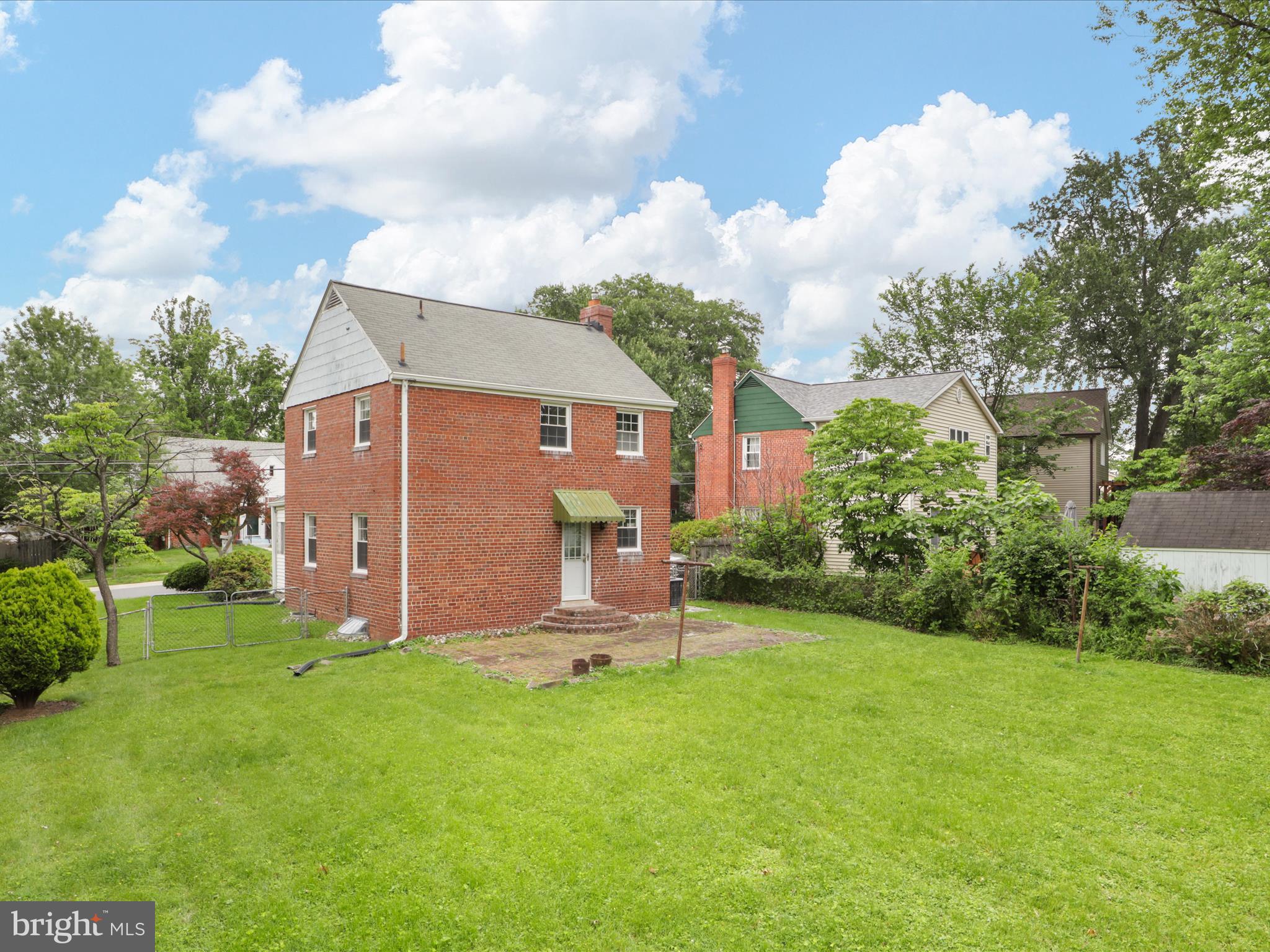 1808 Cody Drive Silver Spring, MD 20902 - Photo 29 of 41 a view of a chair and table in backyard of the house