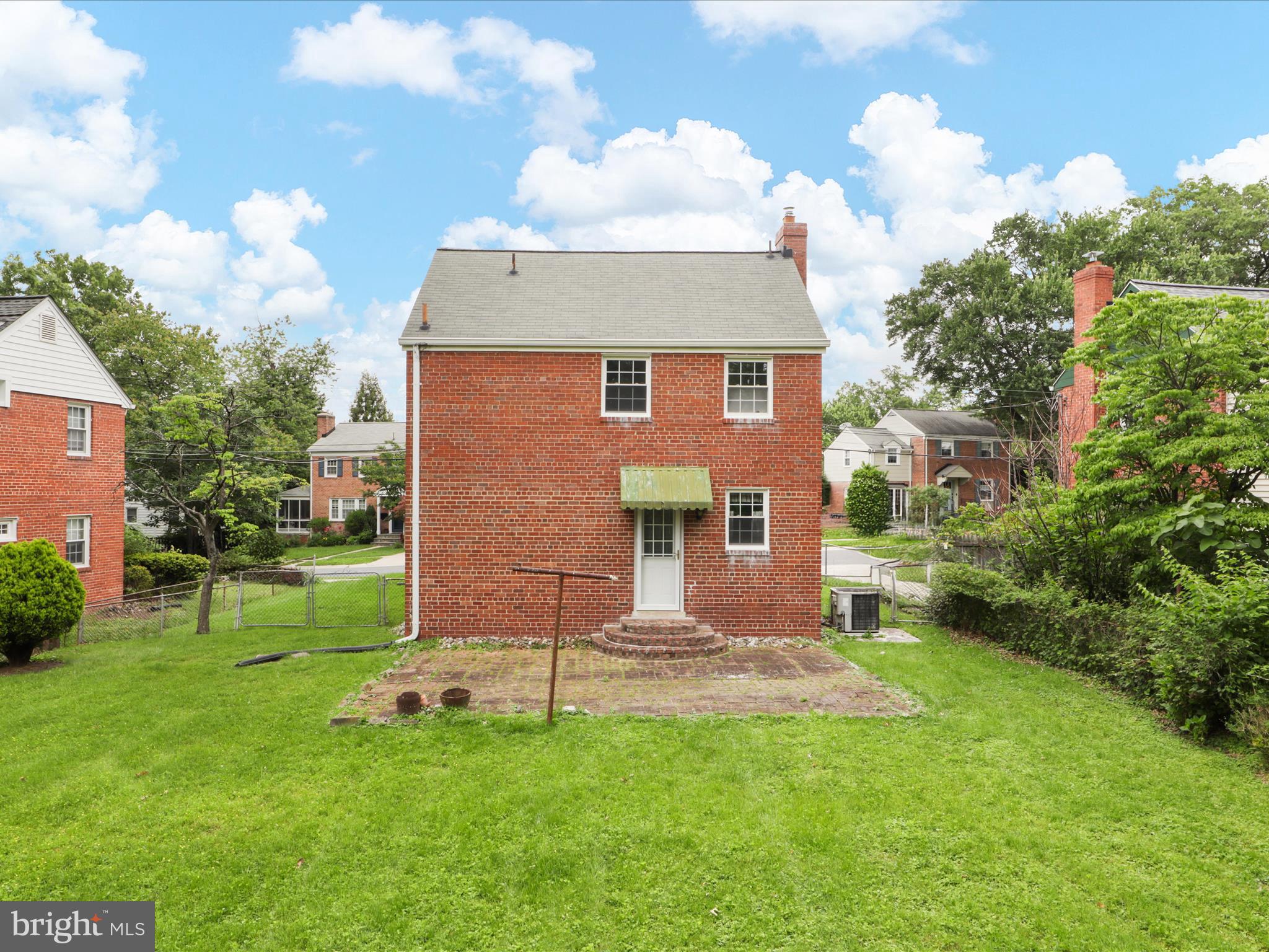 1808 Cody Drive Silver Spring, MD 20902 - Photo 30 of 41 a front view of a house with a yard