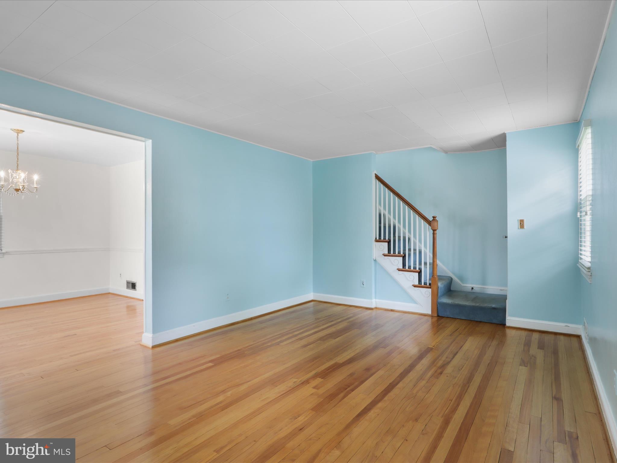 1808 Cody Drive Silver Spring, MD 20902 - Photo 9 of 41 a view of empty room with wooden floor