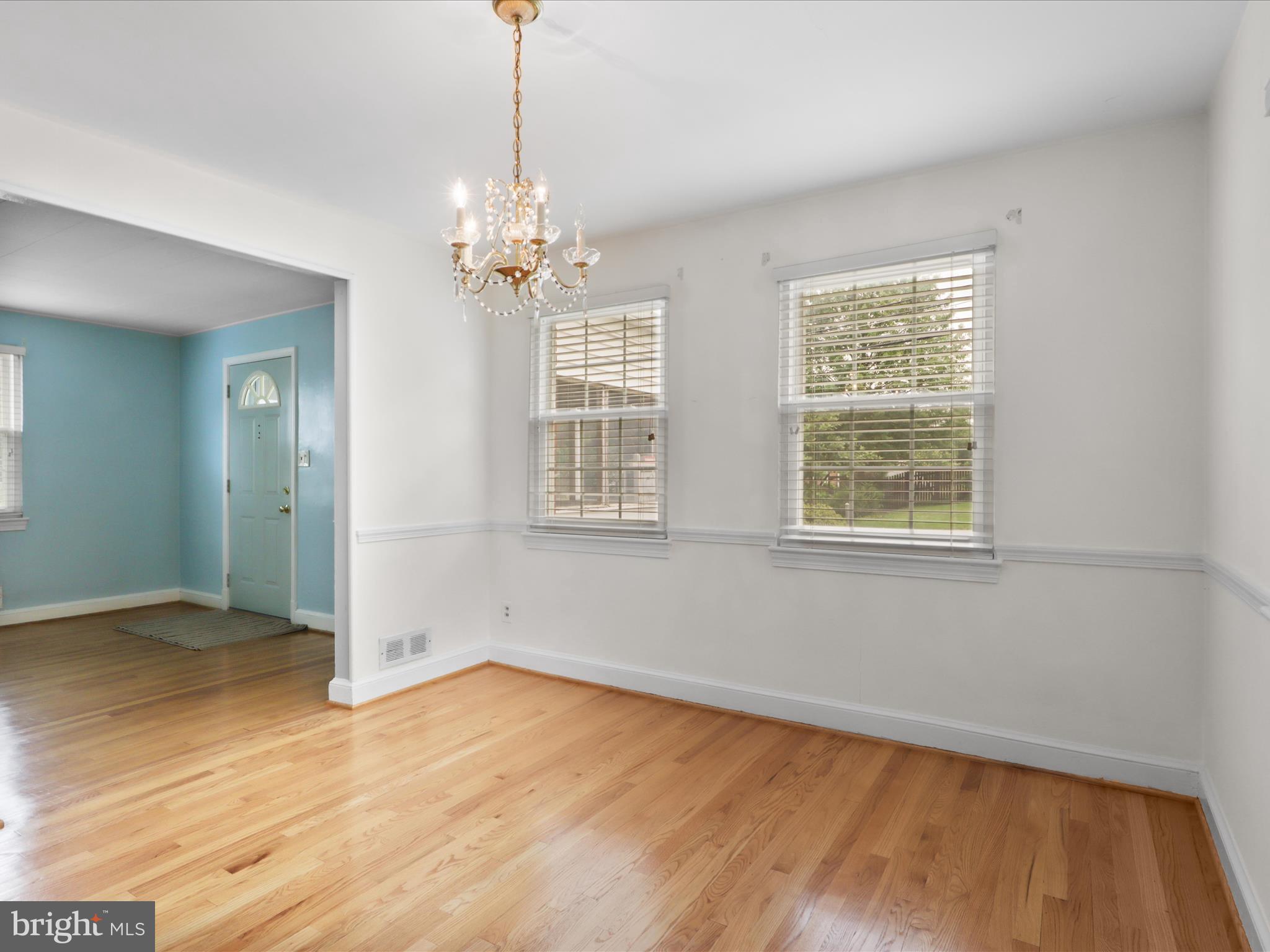 1808 Cody Drive Silver Spring, MD 20902 - Photo 10 of 41 a view of empty room with wooden floor and fan