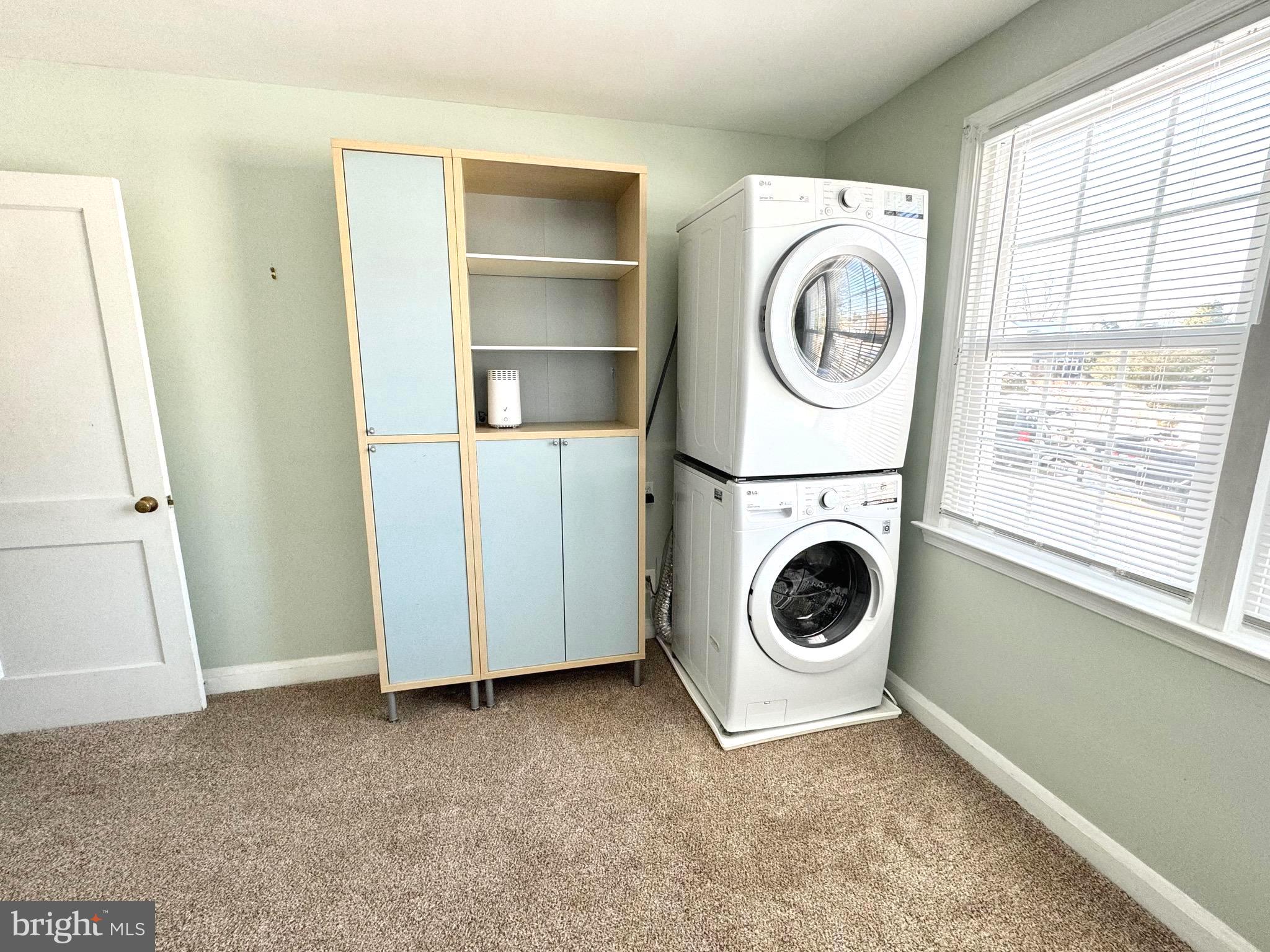 500 Milford Mill Road Pikesville, MD 21208 - Photo 17 of 43 a view of a kitchen with washer and dryer