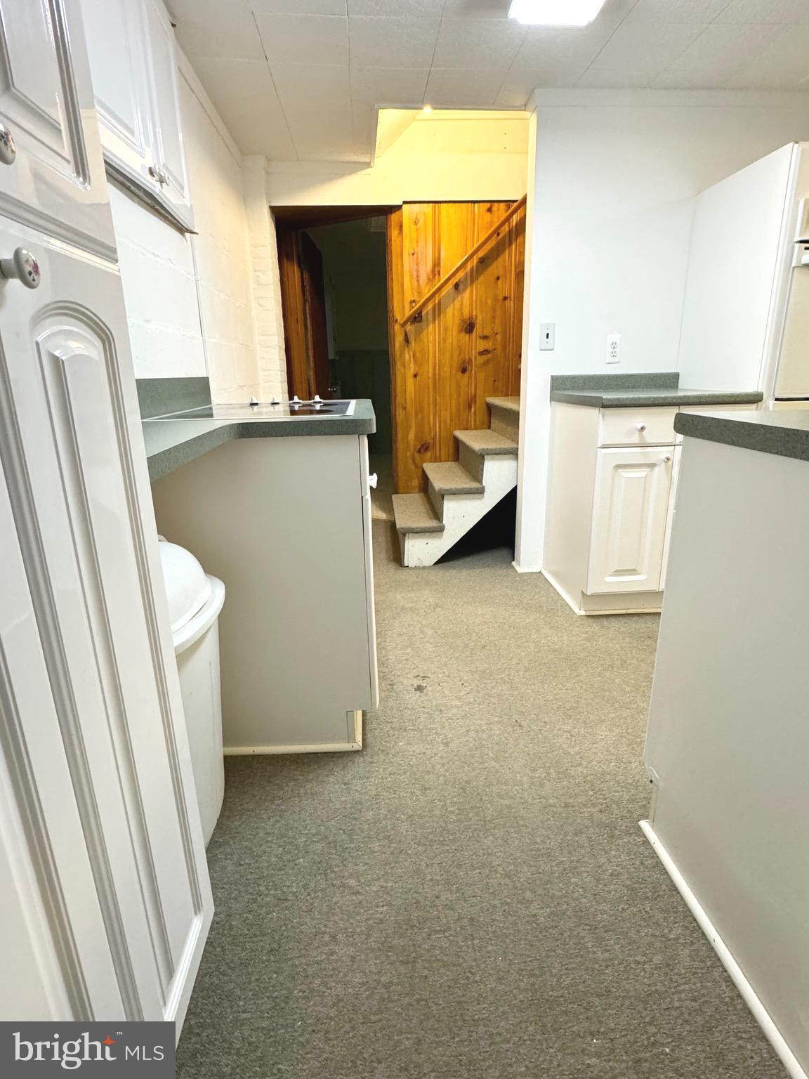 500 Milford Mill Road Pikesville, MD 21208 - Photo 20 of 43 a view of storage and utility room with washer and dryer