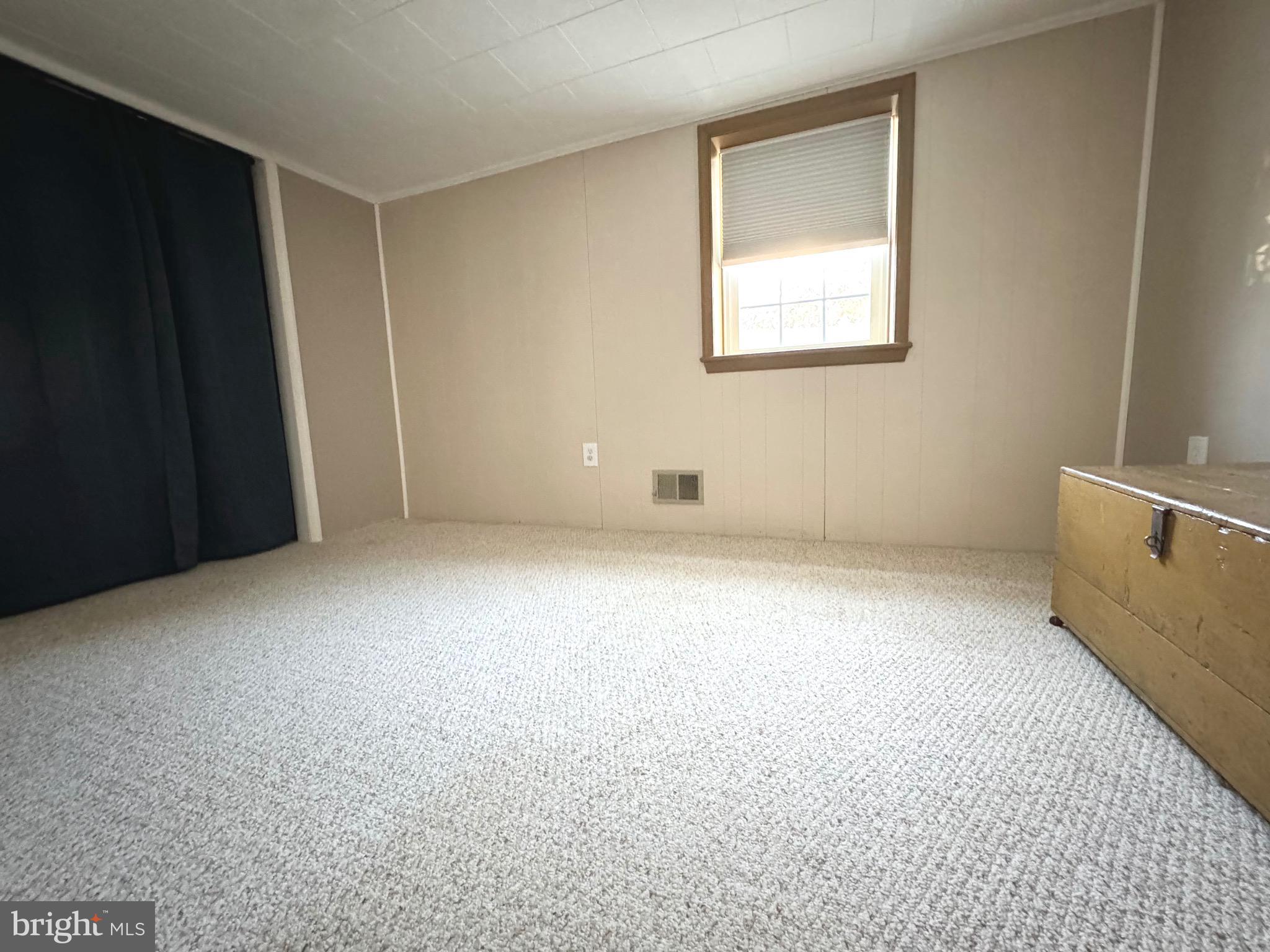 500 Milford Mill Road Pikesville, MD 21208 - Photo 31 of 43 an empty room with windows