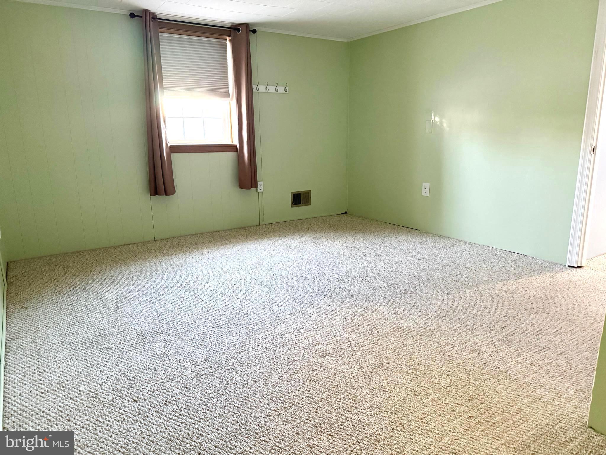 500 Milford Mill Road Pikesville, MD 21208 - Photo 32 of 43 an empty room with windows