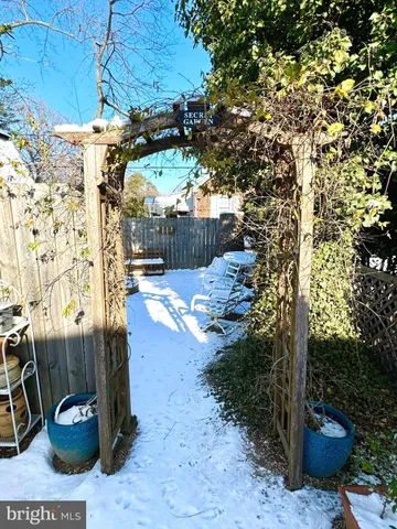 a view of a chairs and table in the patio