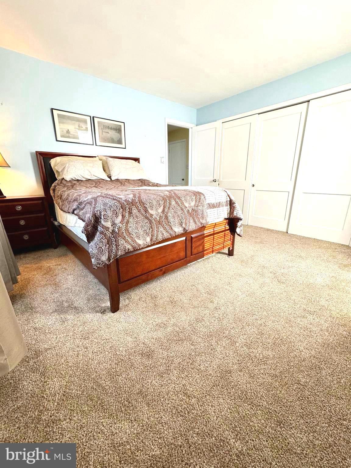 500 Milford Mill Road Pikesville, MD 21208 - Photo 6 of 43 a bedroom with a bed and a large window