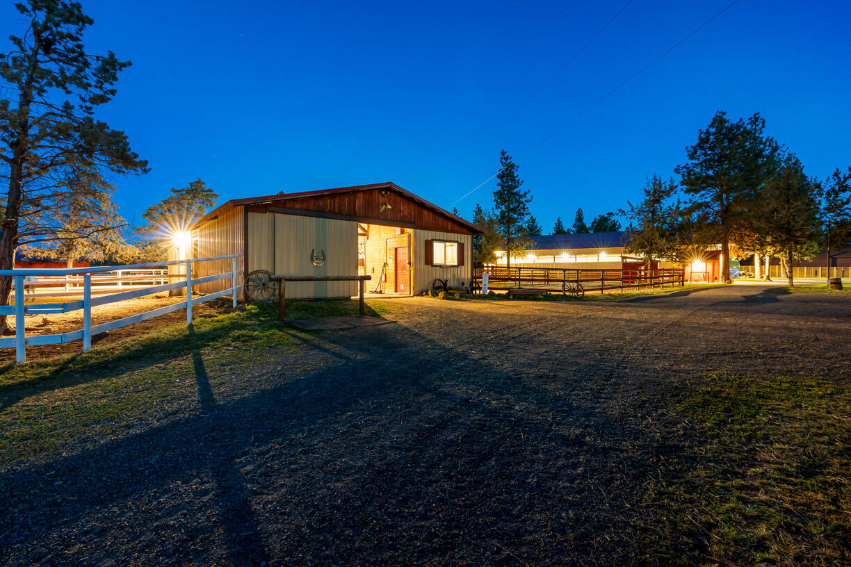 67500 Harrington Loop Road Bend, OR 97703 - Photo 24 of 72 a view of a house with a yard