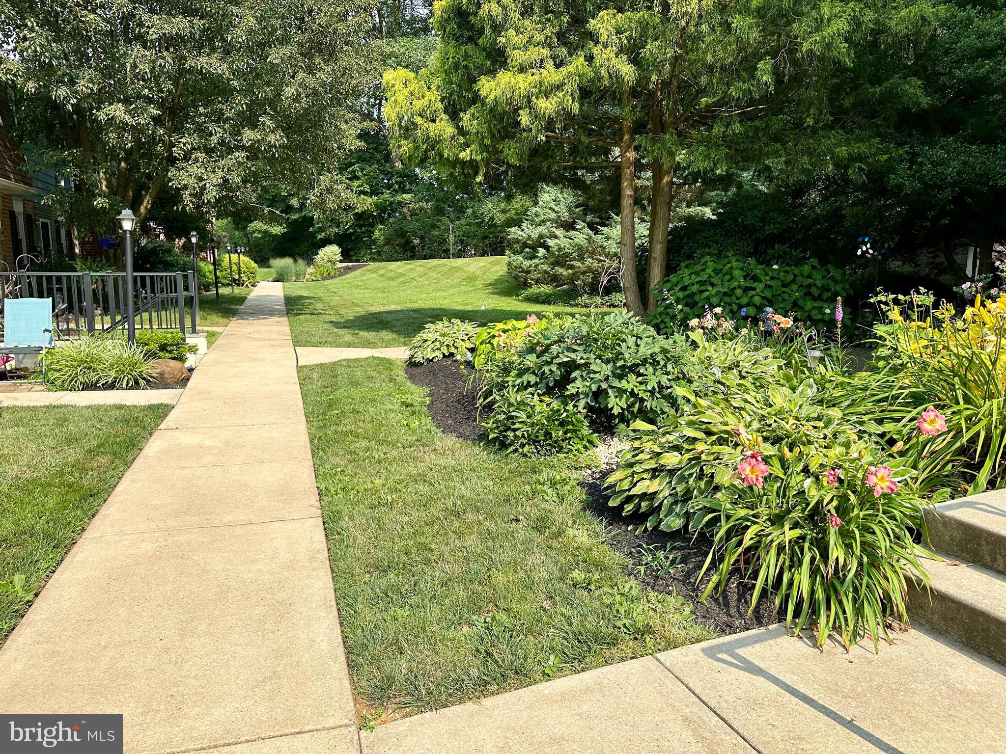 207 Walnut Hill Road, Unit B14 West Chester, PA 19382 - Photo 14 of 21 The walk to the pool, tot lot, and dog park