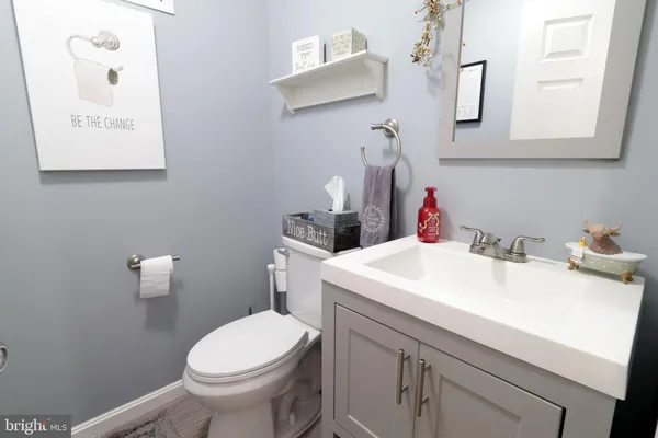 a bed room with a bed and a dresser