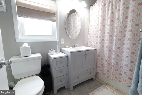 an aerial view of a house with pool yard and outdoor seating
