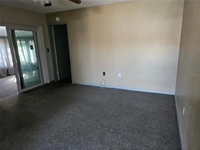 a kitchen with a sink stove and microwave
