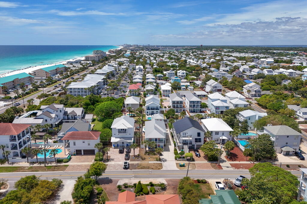 64 Dolphin Street Destin, FL 32541 - Photo 101 of 107 an aerial view of residential houses with outdoor space