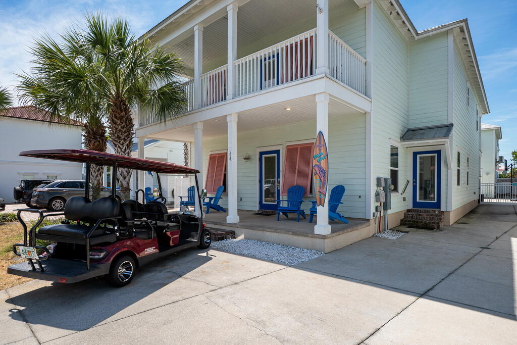 64 Dolphin Street Destin, FL 32541 - Photo 23 of 107 a car parked in front of a building