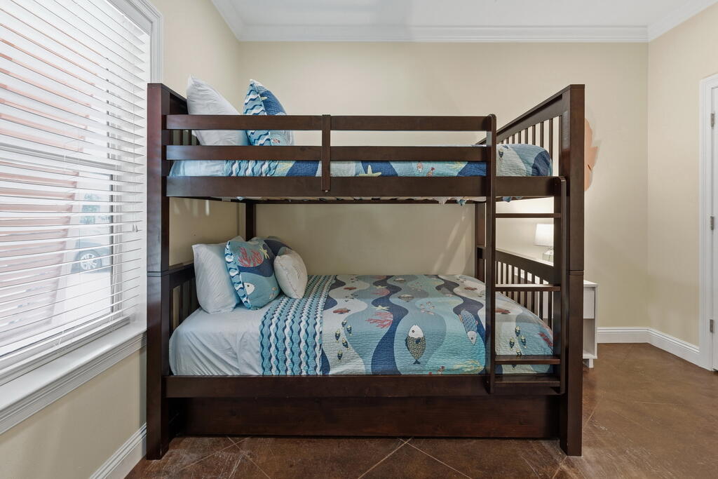 64 Dolphin Street Destin, FL 32541 - Photo 34 of 107 a bedroom with a bed and a window