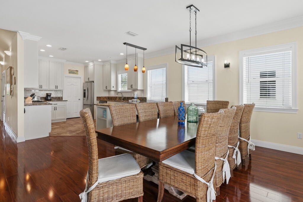 64 Dolphin Street Destin, FL 32541 - Photo 56 of 107 a view of a dining room with furniture window and wooden floor