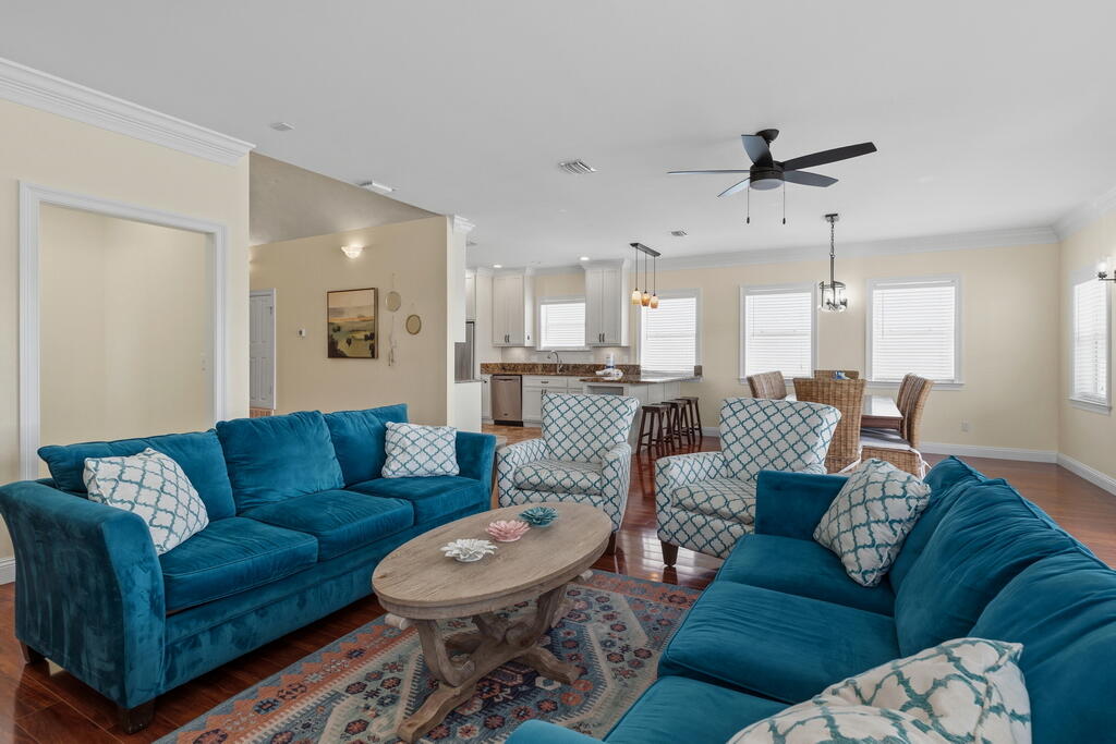 64 Dolphin Street Destin, FL 32541 - Photo 60 of 107 a living room with furniture and a large window