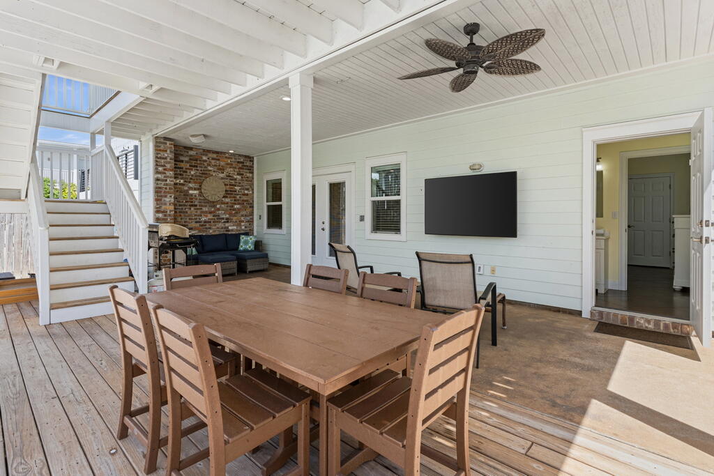 64 Dolphin Street Destin, FL 32541 - Photo 6 of 107 a view of a dining room with furniture window and wooden floor