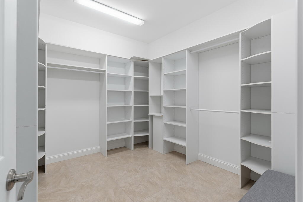 64 Dolphin Street Destin, FL 32541 - Photo 74 of 107 a view of an empty room with empty racks