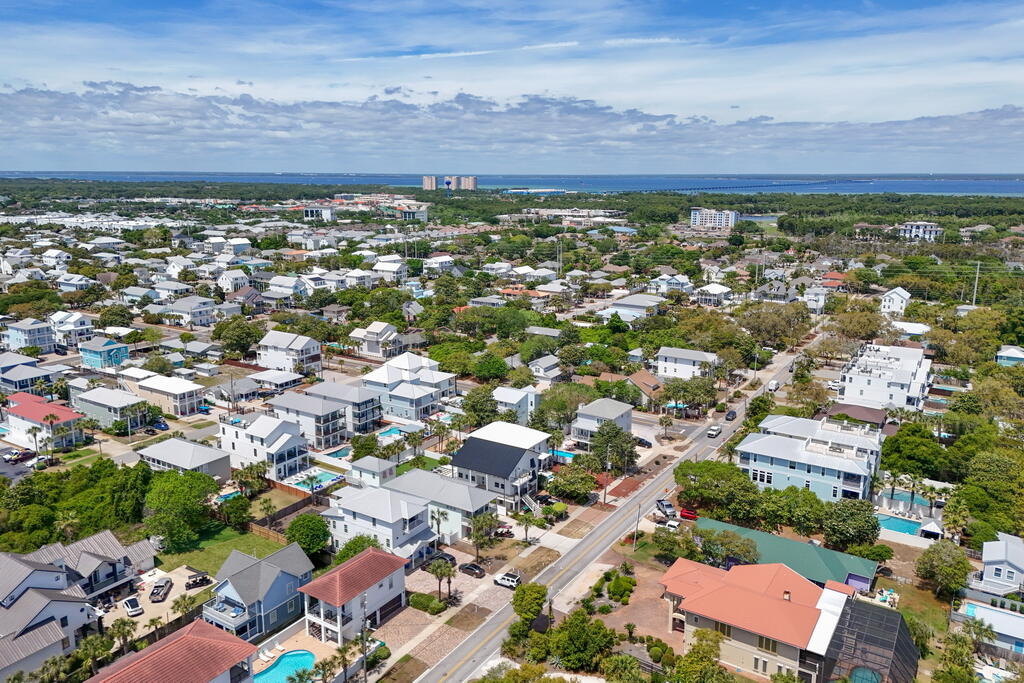 64 Dolphin Street Destin, FL 32541 - Photo 8 of 107 an aerial view of residential house and outdoor space