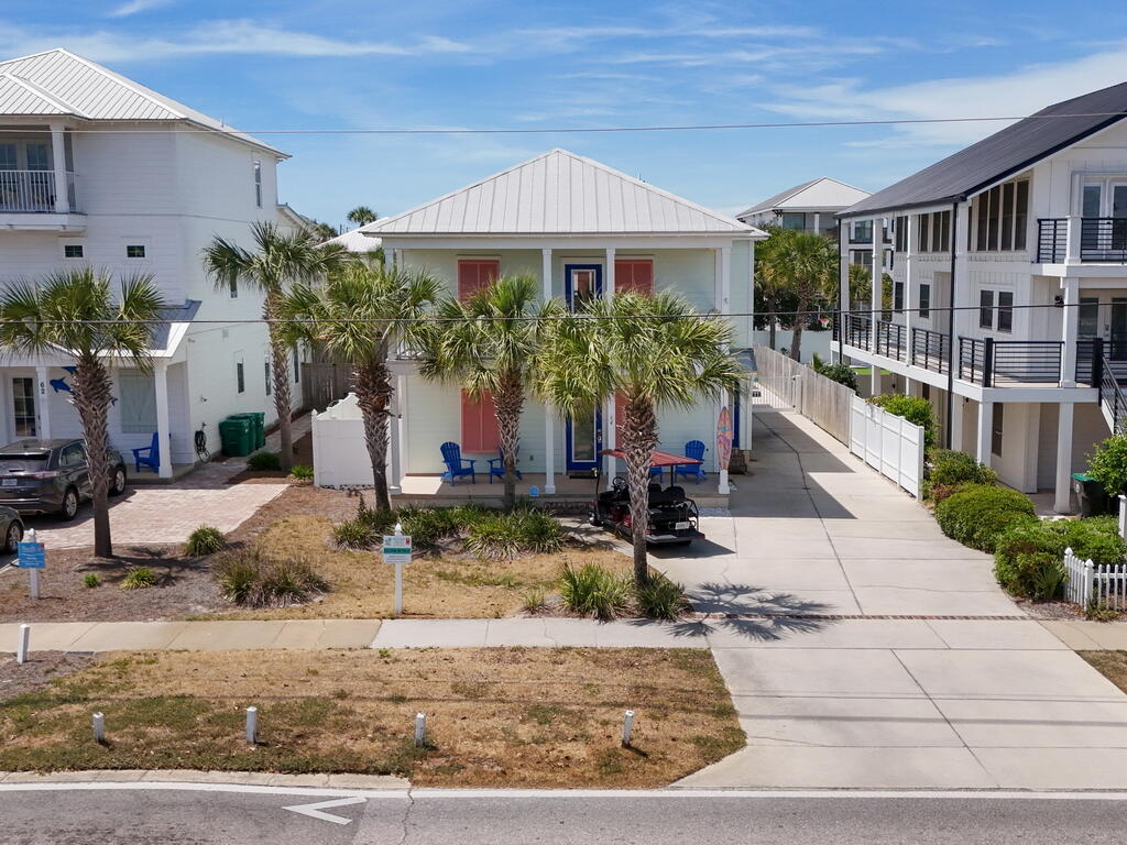 64 Dolphin Street Destin, FL 32541 - Photo 93 of 107 a front view of a house with entertaining space