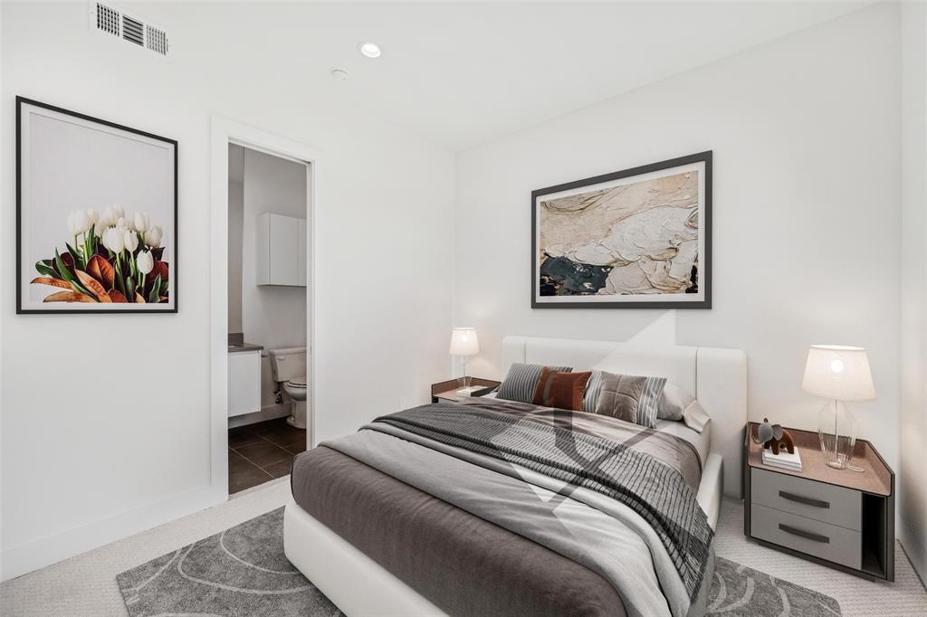 3064 ChImes Street Dallas, TX 75219 - Photo 22 of 40 a bedroom with a bed and a painting on the wall