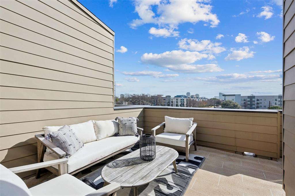 3064 ChImes Street Dallas, TX 75219 - Photo 33 of 40 a view of a terrace with couches and a table