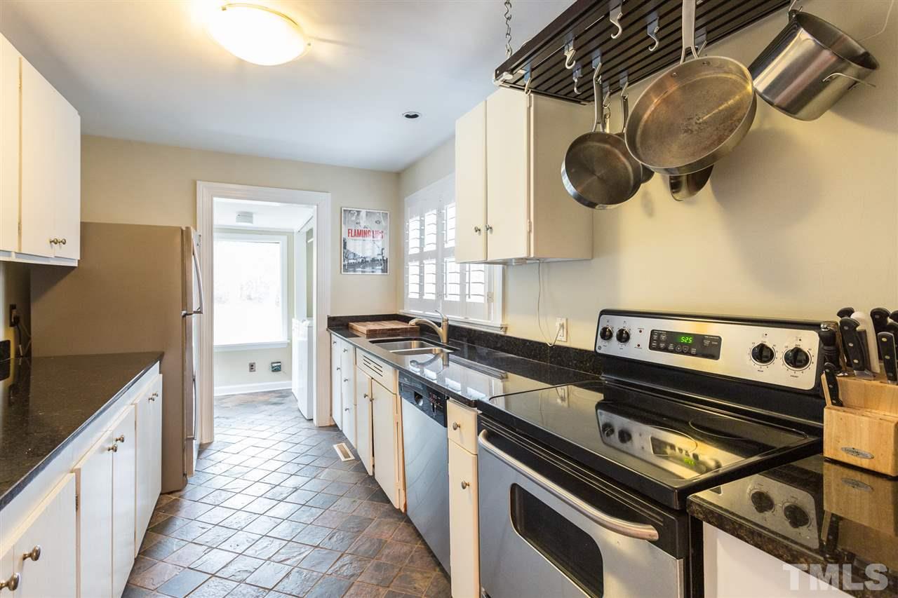 3008 Medlin Drive Raleigh, NC 27607 - Photo 13 of 29 a kitchen with a stove a sink and dishwasher