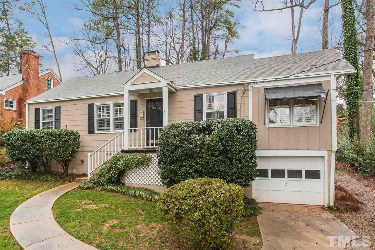 3008 Medlin Drive Raleigh, NC 27607 - Photo 3 of 29 a front view of a house with a garden
