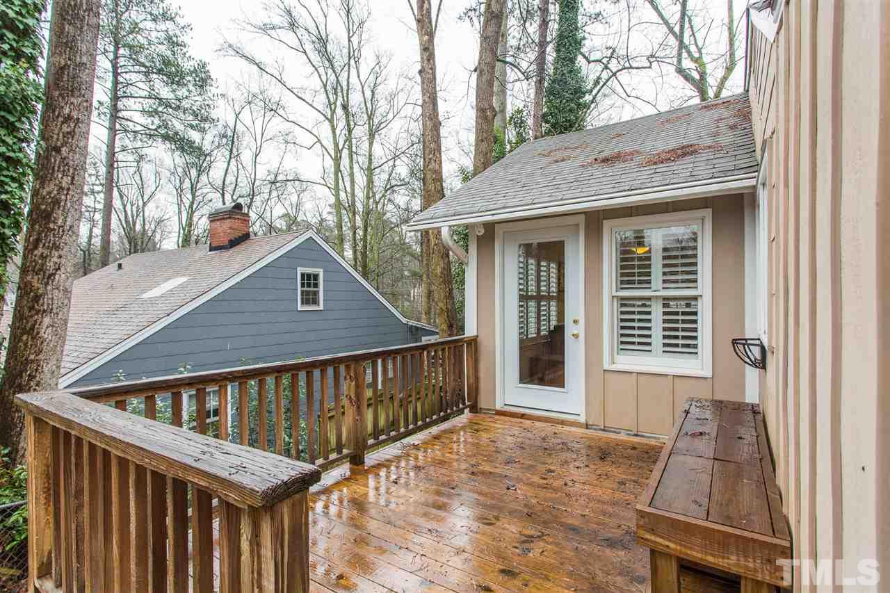 3008 Medlin Drive Raleigh, NC 27607 - Photo 24 of 29 a view of a house with backyard and deck