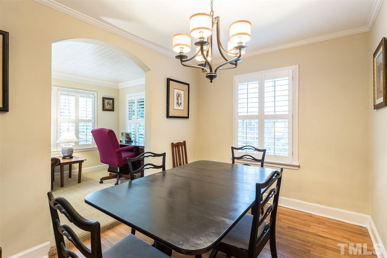 3008 Medlin Drive Raleigh, NC 27607 - Photo 8 of 29 a view of a dining room with furniture window and wooden floor