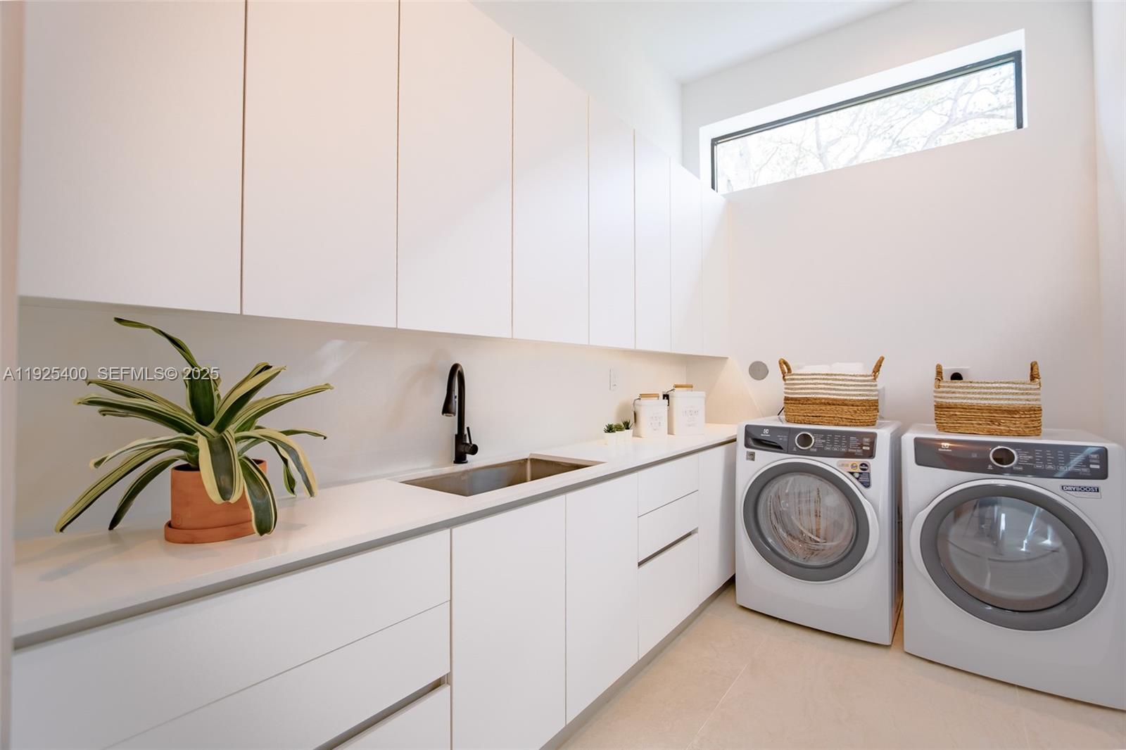 9840 Southwest 73rd Court Pinecrest, FL 33156 - Photo 33 of 64 spacious Laundry