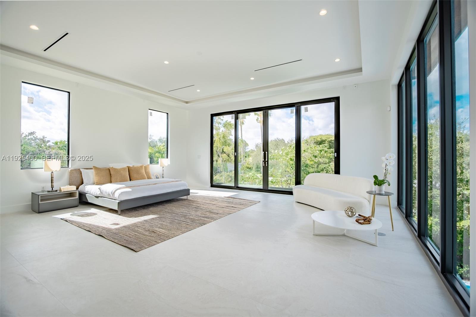 9840 Southwest 73rd Court Pinecrest, FL 33156 - Photo 38 of 64 Primary suite