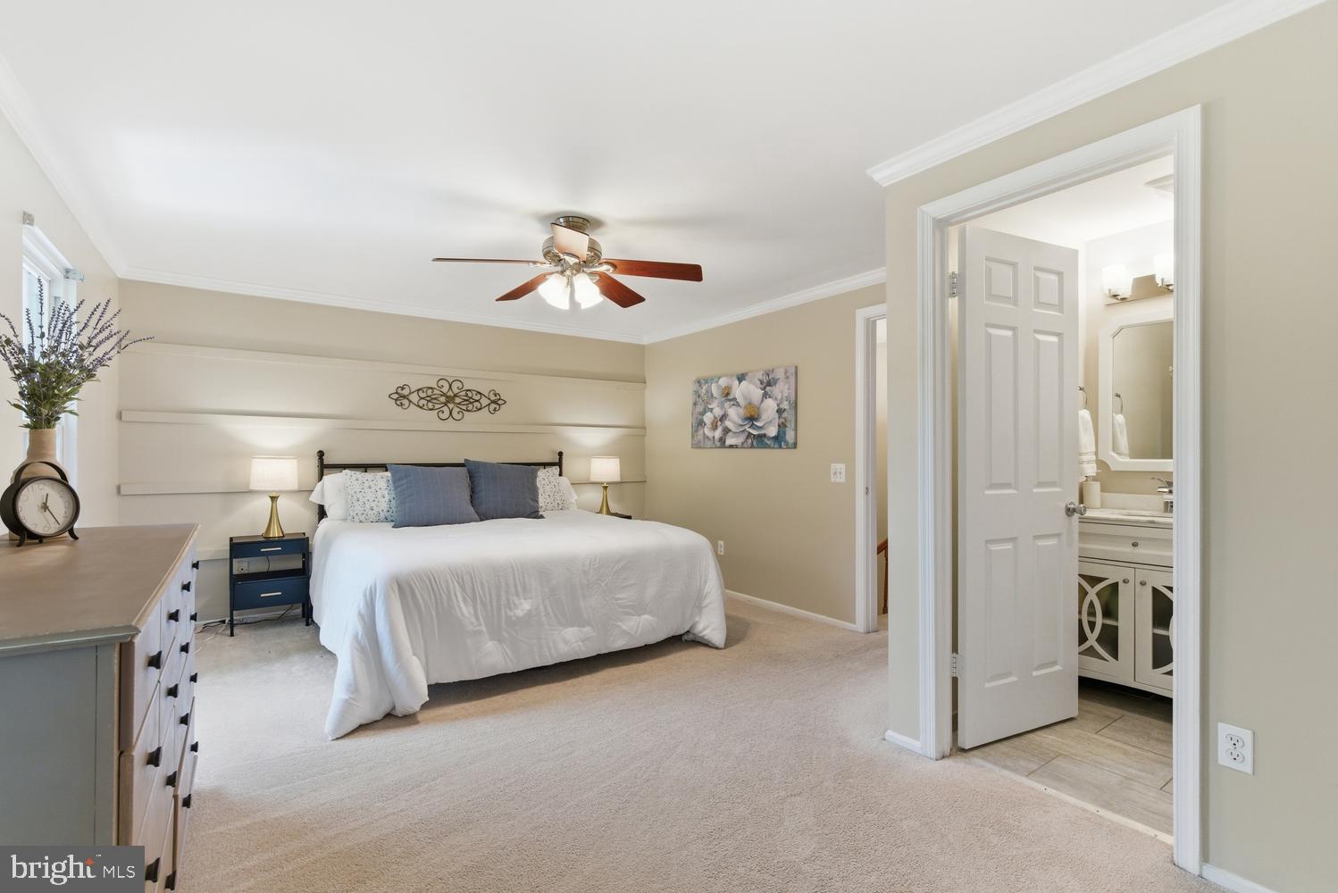 10601 Reed's Landing Circle Burke, VA 22015 - Photo 19 of 45 Spacious primary bedroom with modern charm.