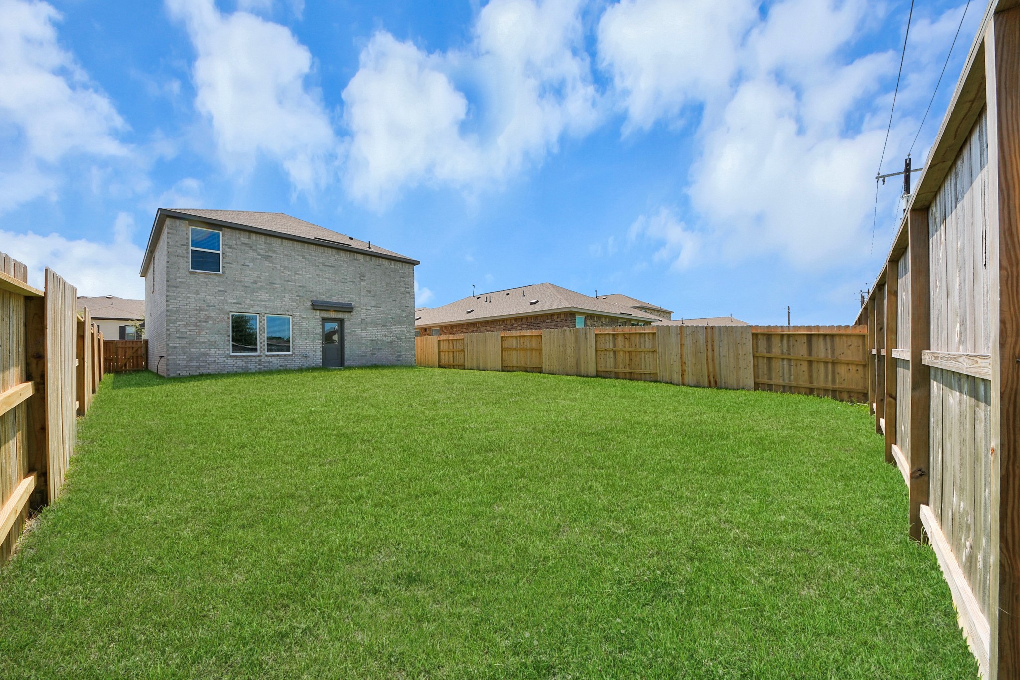2931 Summer Breeze Way Angleton, TX 77515 - Photo 24 of 30 a house view with a garden space