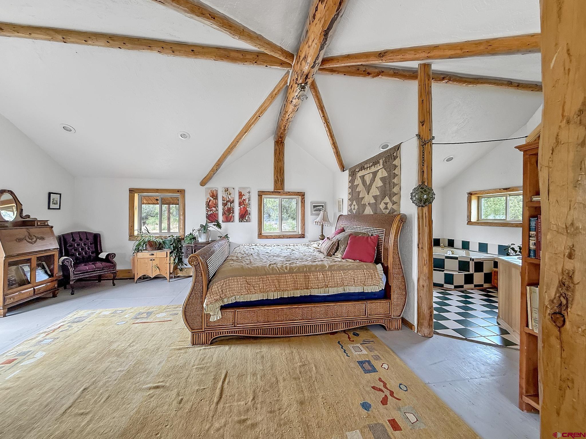 41263 Highway 133 Paonia, CO 81428 - Photo 24 of 44 a bedroom with furniture and a window