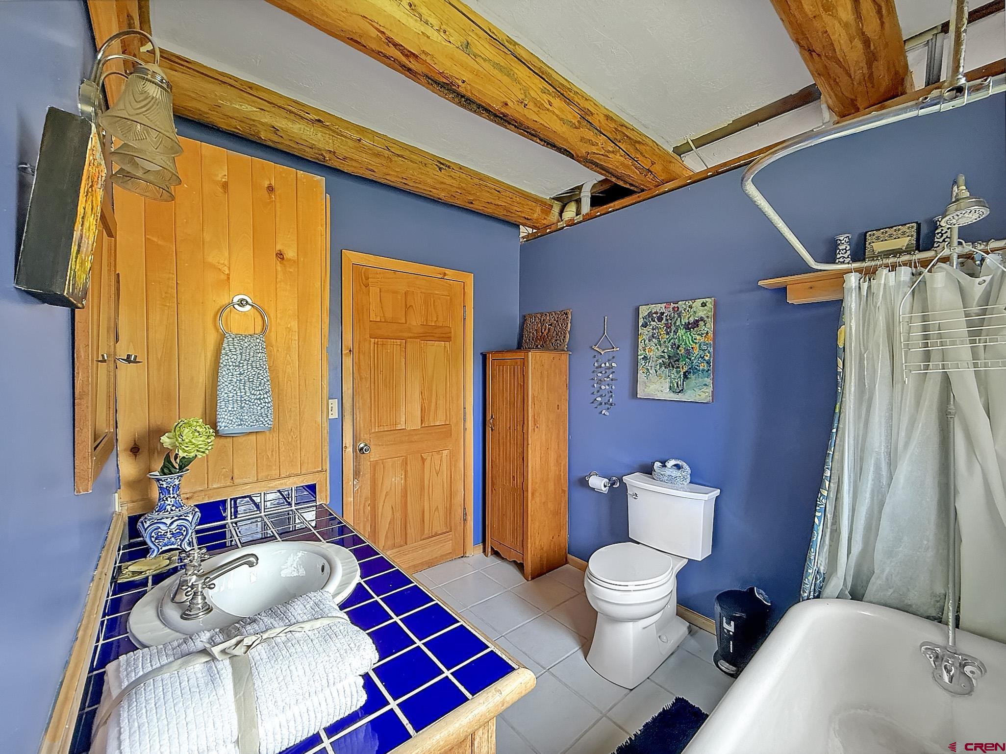 41263 Highway 133 Paonia, CO 81428 - Photo 26 of 44 a bathroom with a sink toilet and shower
