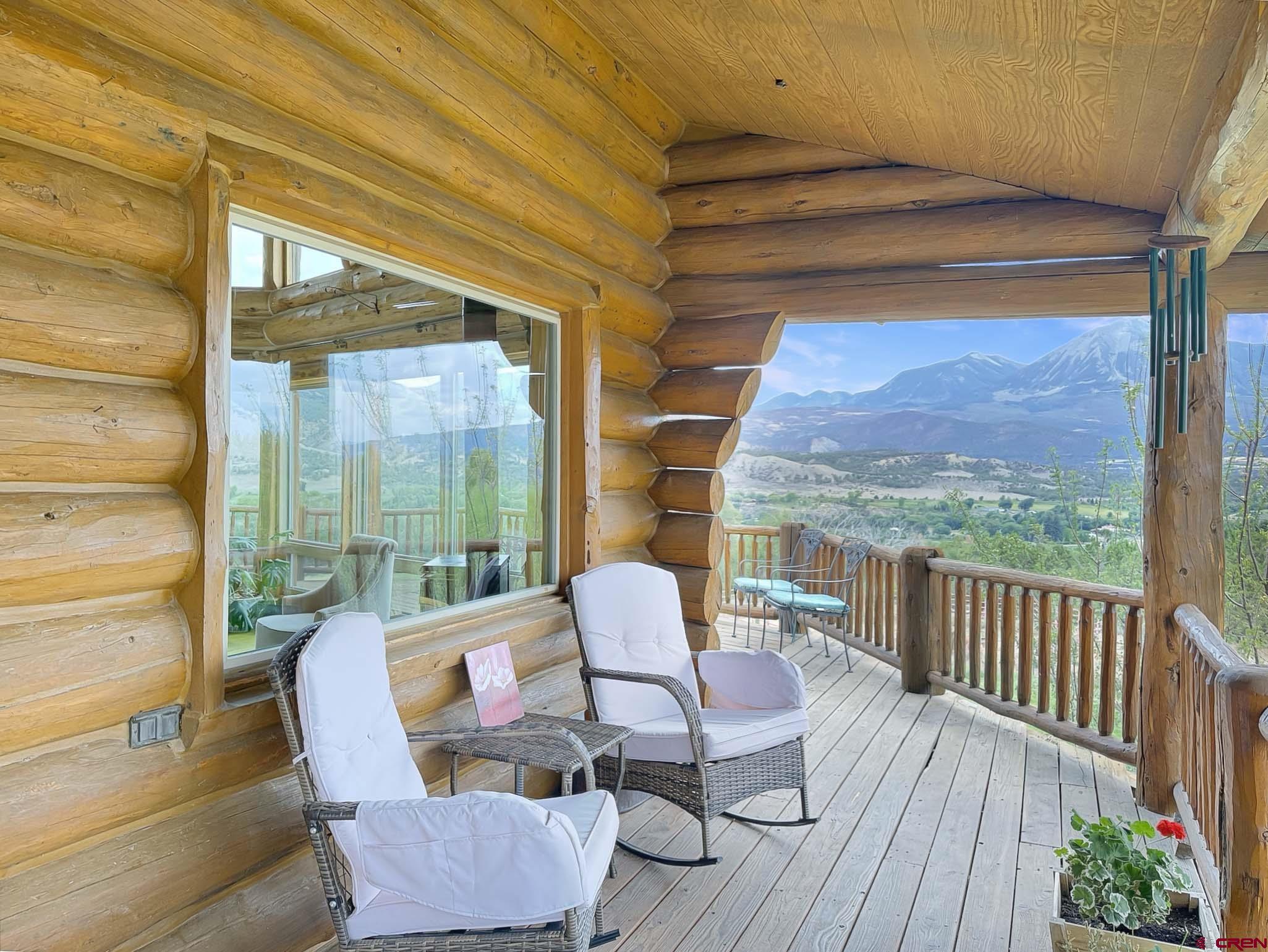 41263 Highway 133 Paonia, CO 81428 - Photo 8 of 44 a balcony with wooden floor and furniture