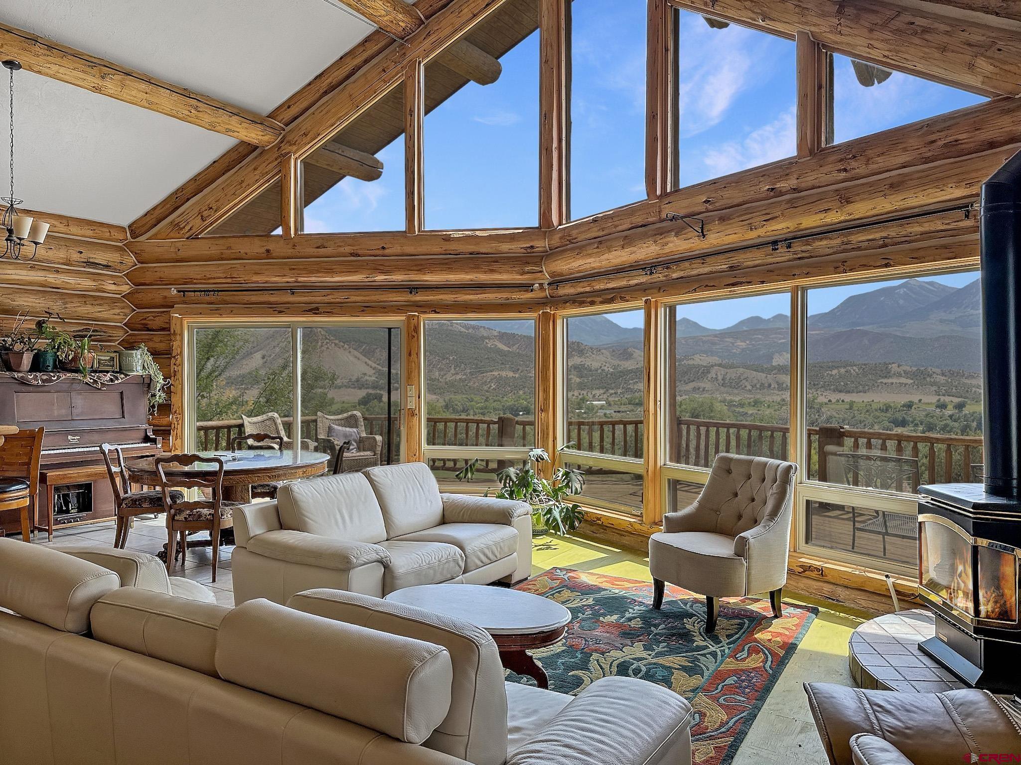 41263 Highway 133 Paonia, CO 81428 - Photo 10 of 44 a living room with furniture a large window