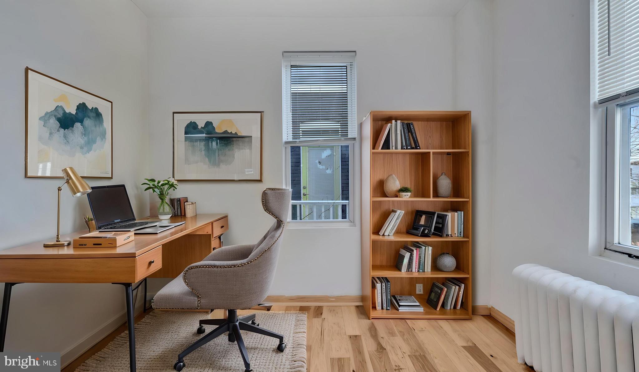 1528 E Street Southeast Washington, DC 20003 - Photo 16 of 19 a workspace with lounge chair and a window
