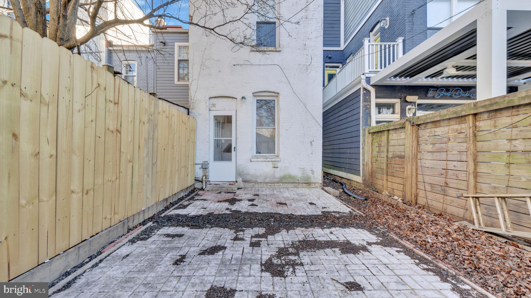 1528 E Street Southeast Washington, DC 20003 - Photo 19 of 19 a view of a grey house with a street
