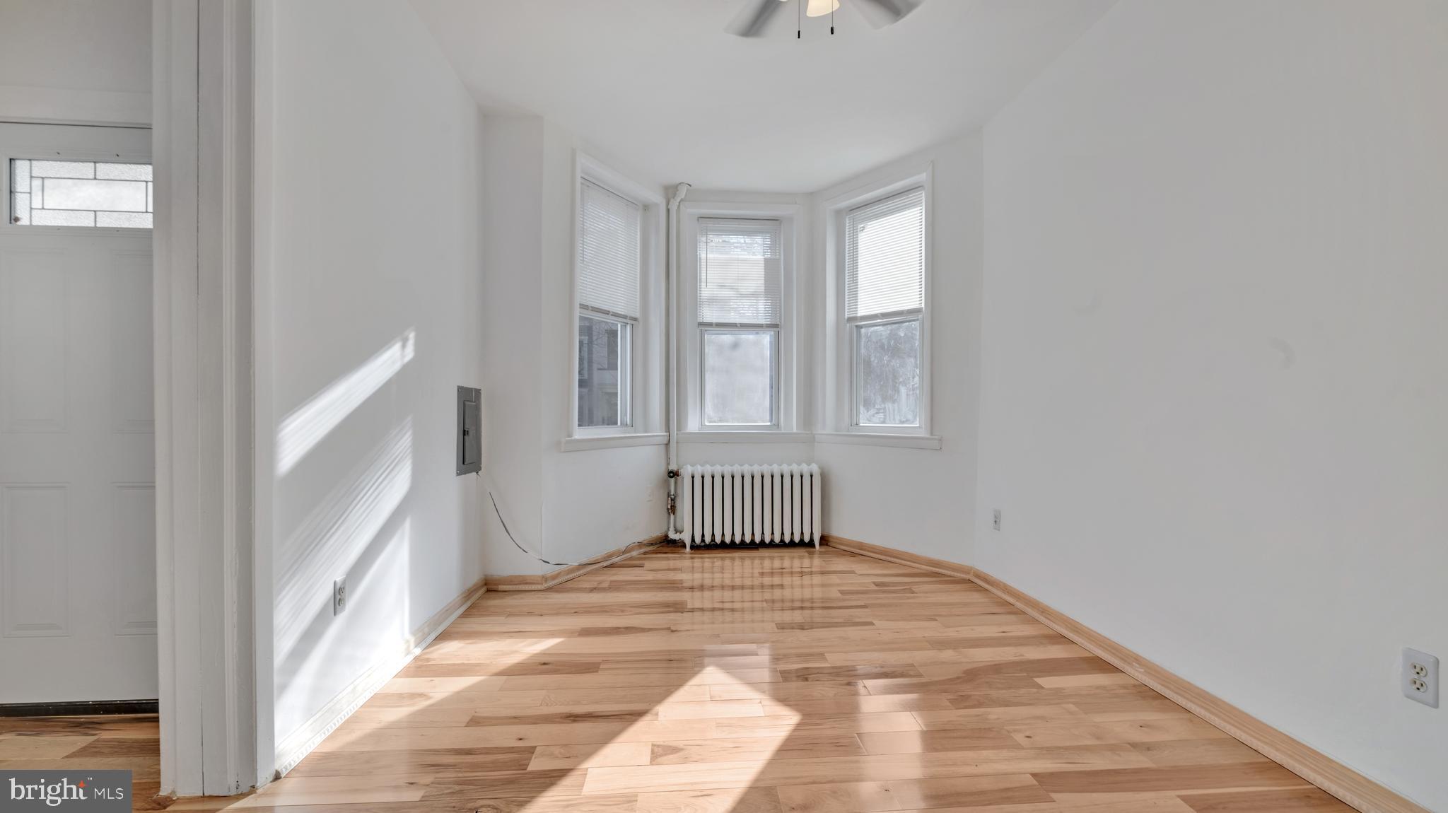 1528 E Street Southeast Washington, DC 20003 - Photo 3 of 19 a view of an empty room with a window