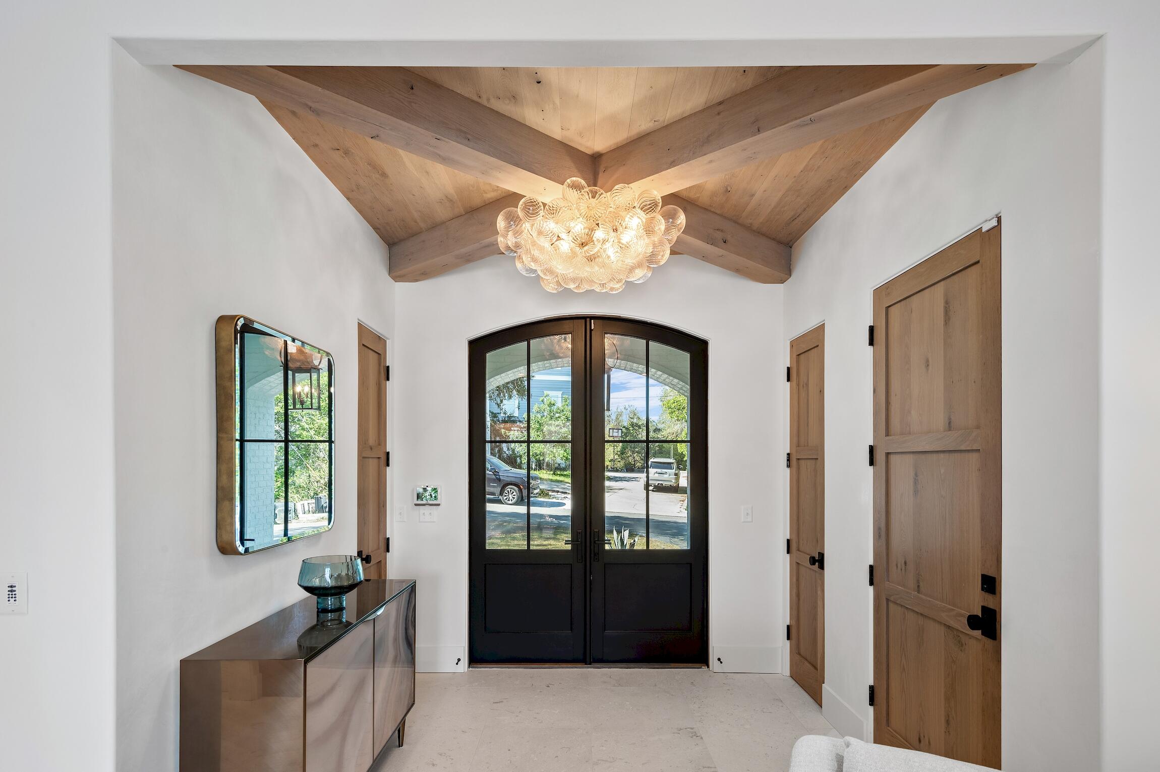 102 Bullard Road Santa Rosa Beach, FL 32459 - Photo 11 of 63 a very nice looking room with a large window and chandelier