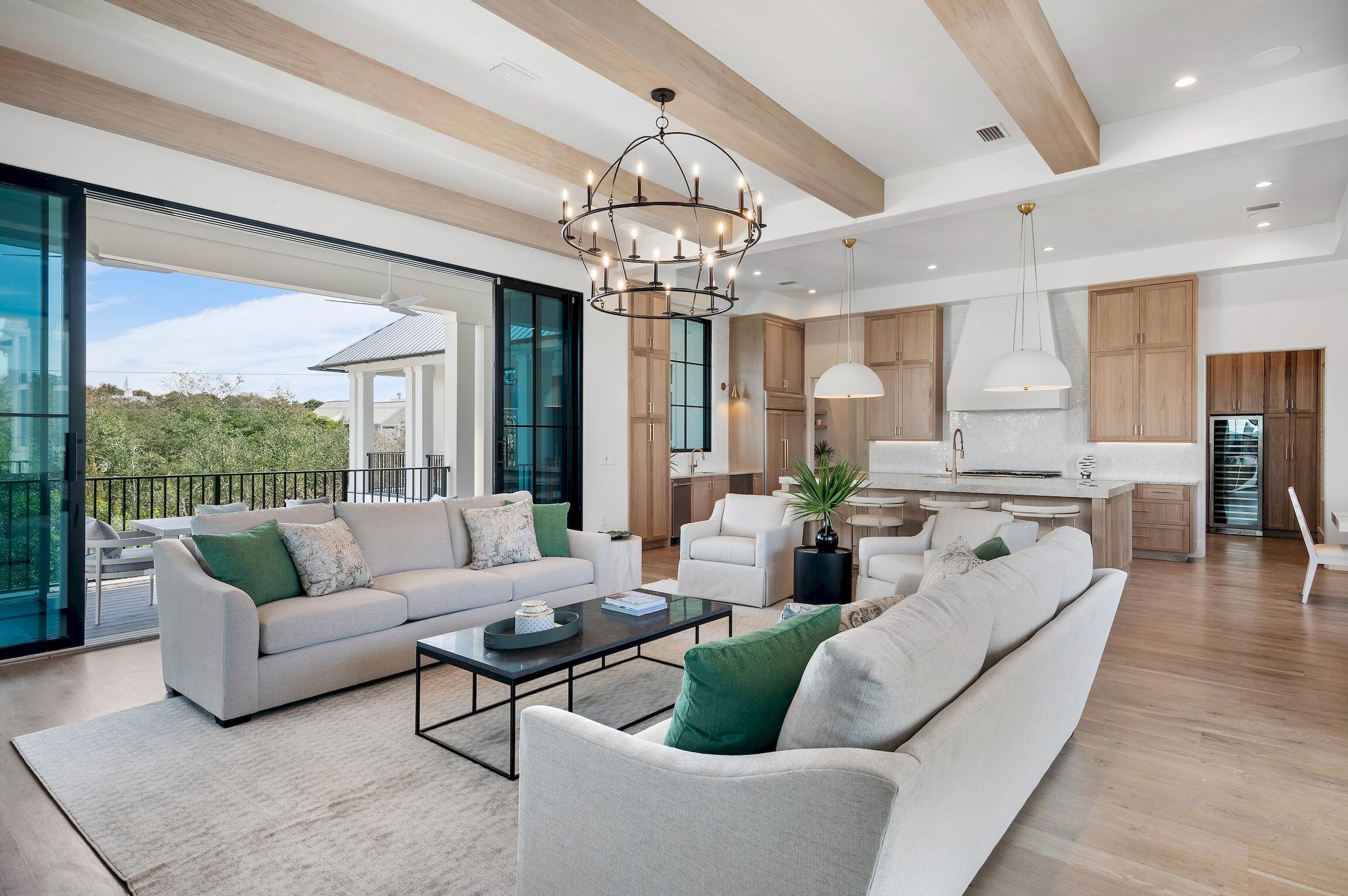 102 Bullard Road Santa Rosa Beach, FL 32459 - Photo 21 of 63 a living room with furniture dining table and a chandelier